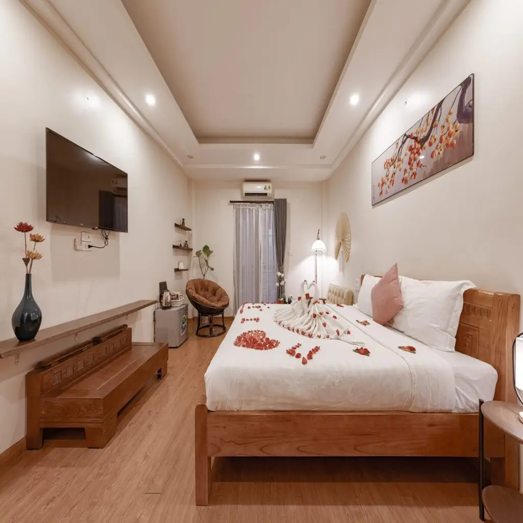 Phòng ngủ khách sạn Dodo Home rộng rãi với nội thất sang trọng tại Hà Nội